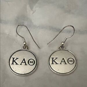 Silver Kappa Alpha Theta sorority drop earrings.